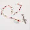 Chicken and scarecrow row counter with colourful beads for an eye catching row counter chain. Displayed on a white background.