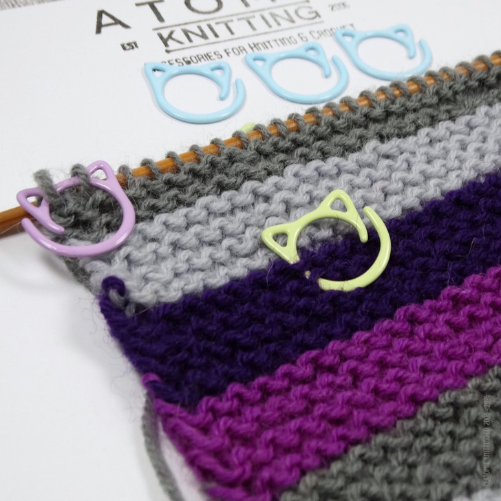 Set of fifteen cat-themed open ring removable stitch markers for knitting, featuring colourful rings, designed for easy marking of stitches in knitting projects.