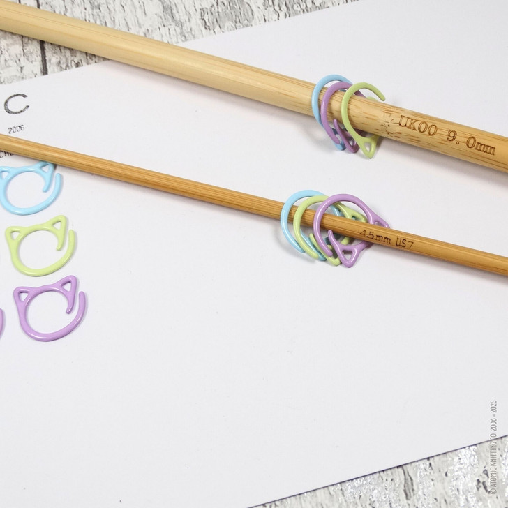 Set of fifteen cat-themed open ring removable stitch markers for knitting, featuring colourful rings, designed for easy marking of stitches in knitting projects.