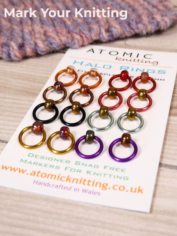 Colourful Halo ring stitch markers on a white backing card