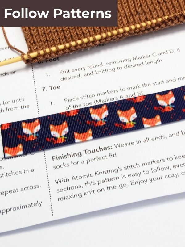 Sheep magnetic pattern guide on a knitting pattern