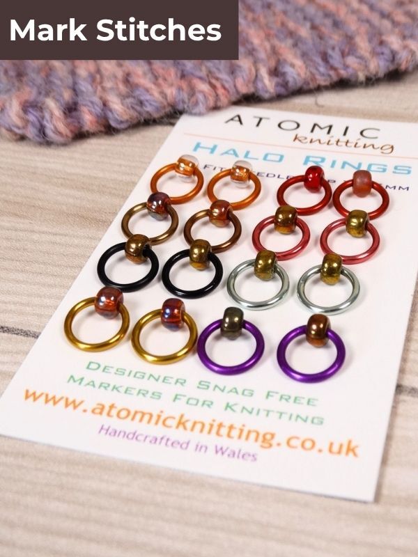 Colourful Halo ring stitch markers on a white backing card