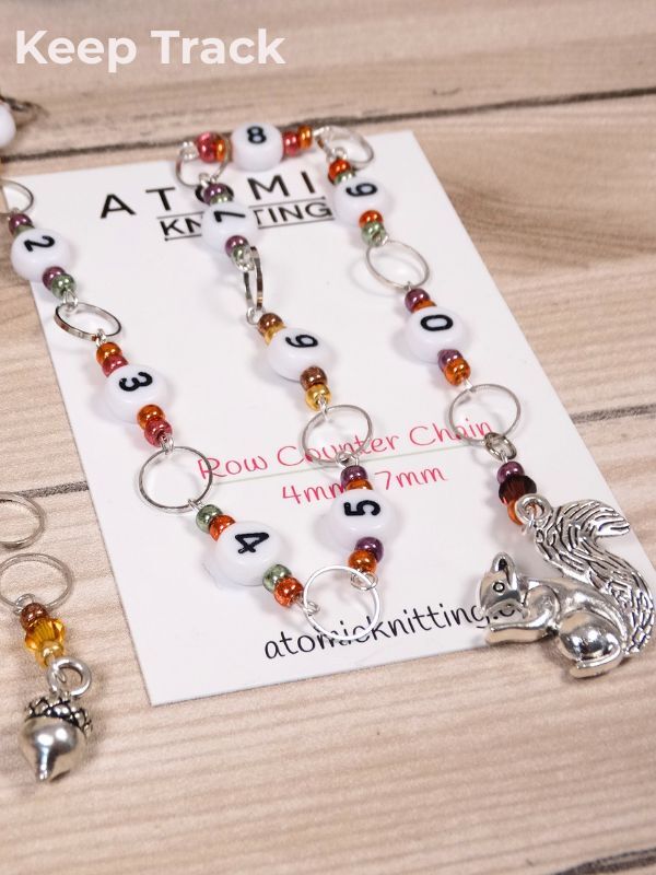 Row Counter Chain on an Atomic Knitting backing card with autumnal colour beads and white number beads