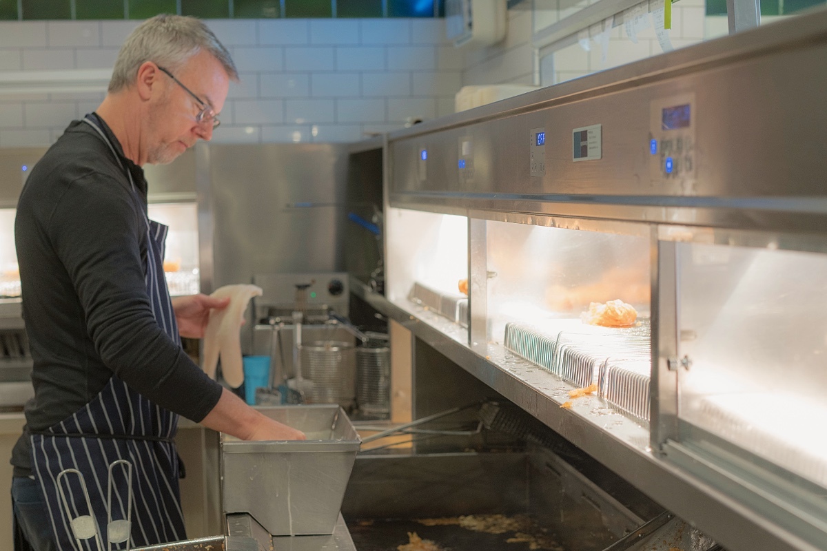 Operator working in a commercial kitchen
