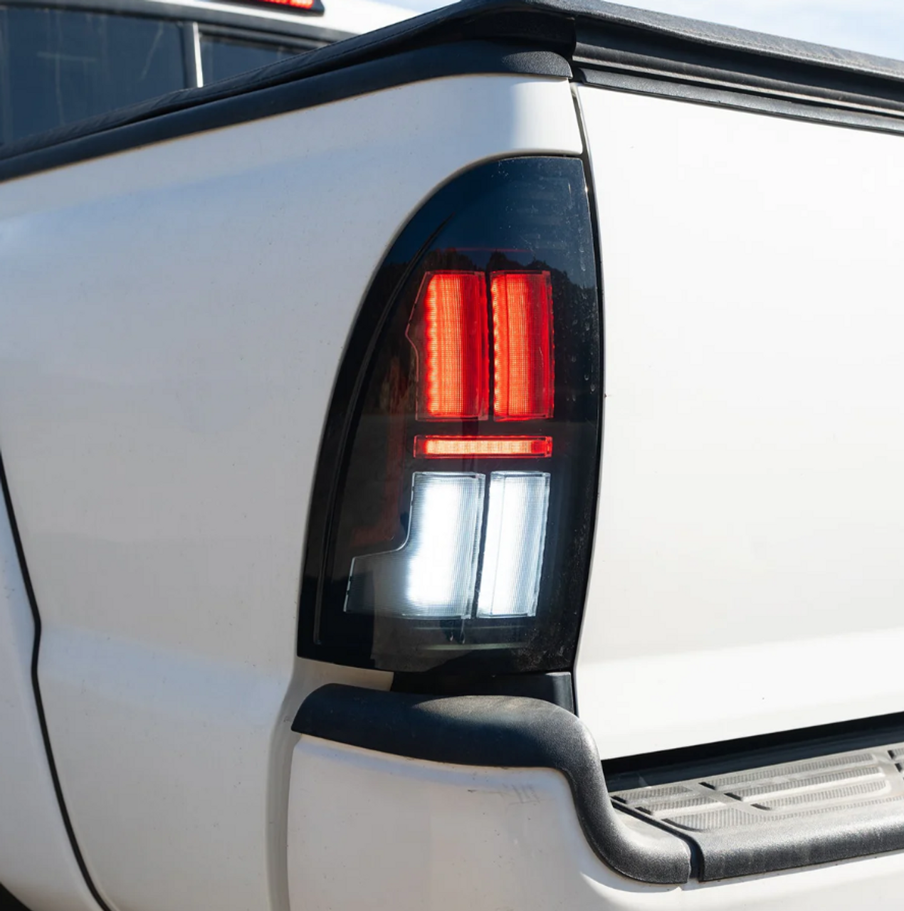 AlphaRex 680052 NOVA-Series Prismatic LED Tail Lights in Black for Toyota Tacoma 2005-2015