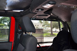 Interior of Jeep Wrangler JK 2 Door with SpiderWebShade ShadeCage Installed