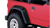 Rear Bushwacker Pocket Style 6" Fender Flare Mounted on Jeep Wrangler TJ