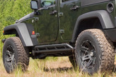 Rugged Ridge RRC Rocker Guards Mounted on Jeep Wrangler JK 4 Door