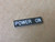 SPRECHER & SCHUH D7-17BE178 LEGEND PLATE 40MM BLACK POWER ON