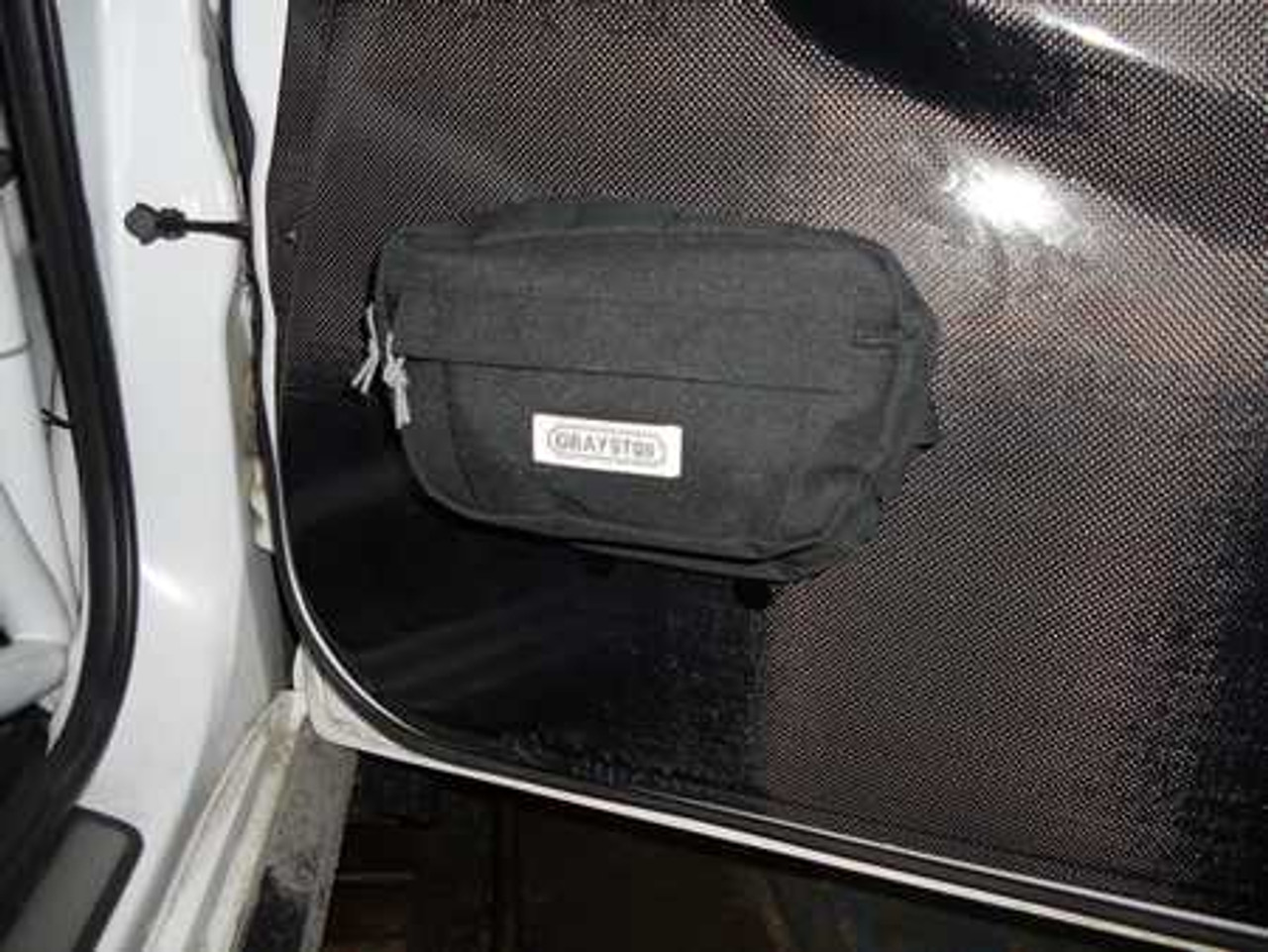 Door or roll cage mounted storage bag