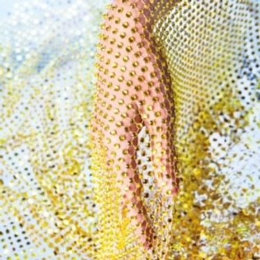 Tips for Applying Rhinestones to Mesh Fabric Tips for Applying Rhinestones to Mesh Fabric