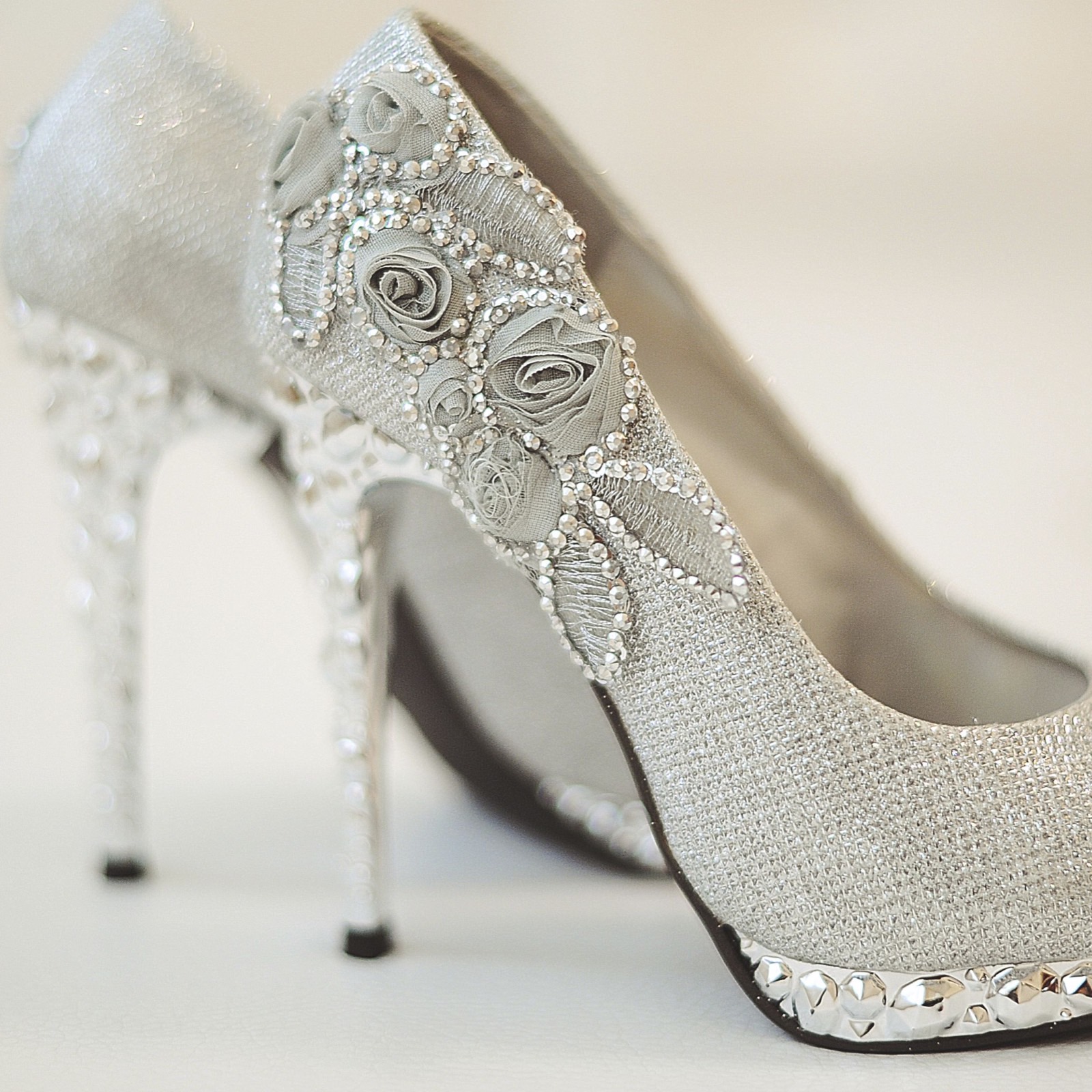Model wearing crystal-embellished heels