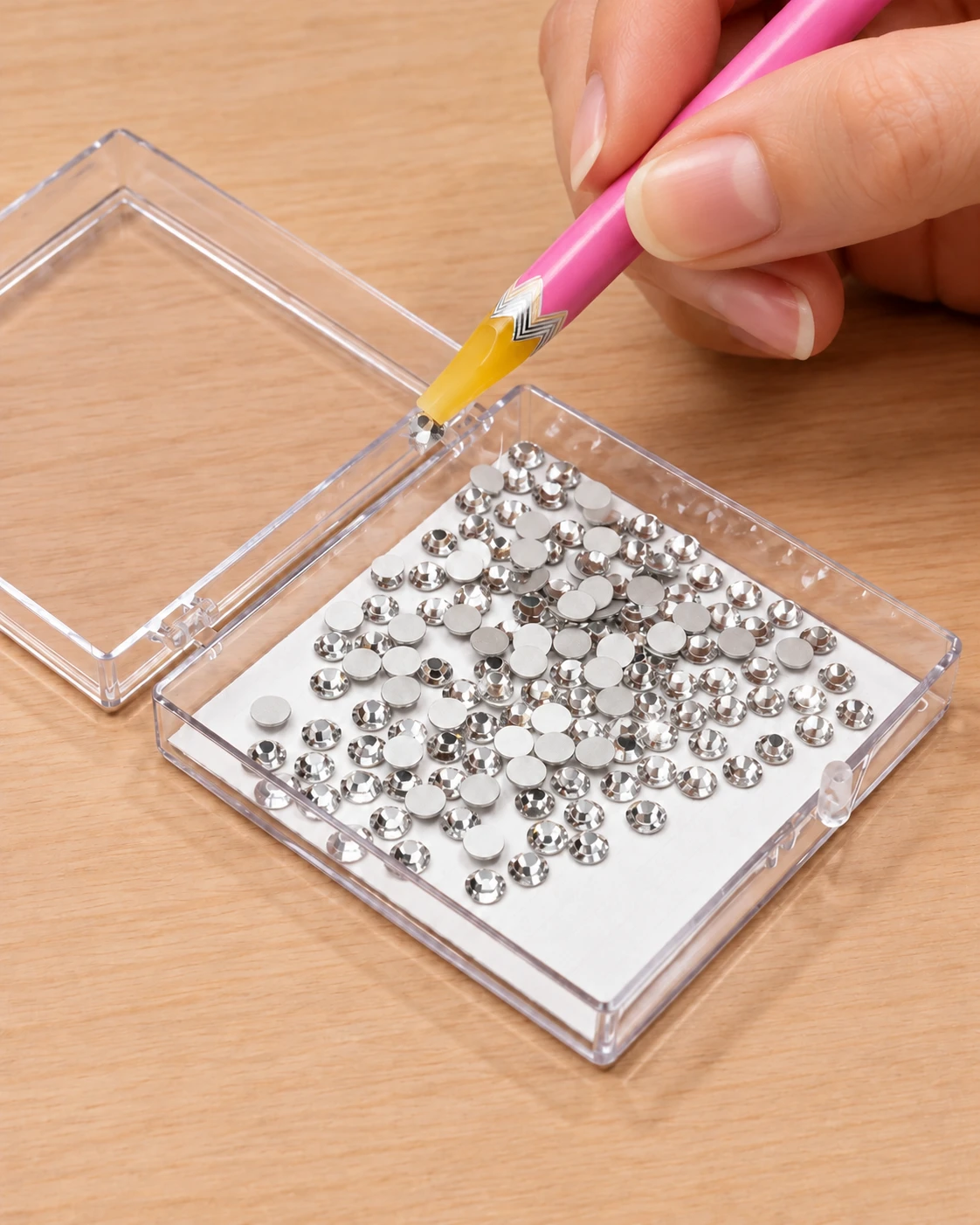 Clear flatback rhinestones in a Magical Tray with a wax pickup pencil