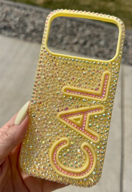 Pair of crystal-embellished heels in packaging