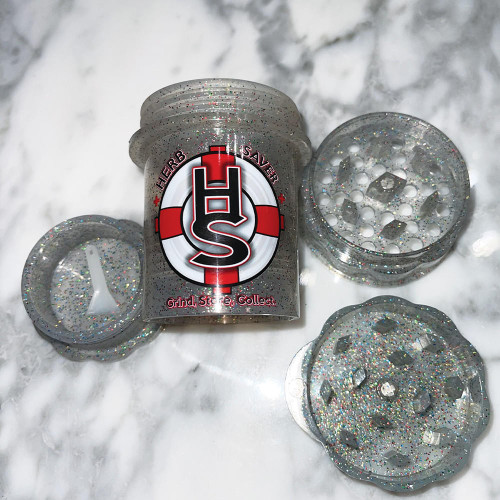 Large clear glitter Herb Saver weed grinder - 4 pieces, showcasing storage and kief collector.