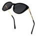 A pair of stylish black sunglasses featuring elegant gold trim along the edges, perfect for a chic look.