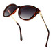 A fashionable pair of sunglasses with a tortoise shell frame, elegantly positioned to emphasize their stylish design.
