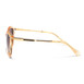 A pair of luxurious gold sunglasses featuring elegant brown lenses, exuding sophistication and style.