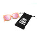Infinite Haze sunglasses and a matching pouch, highlighting a chic accessory for sun protection and fashion.