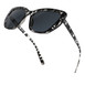 A stylish pair of tortoise print sunglasses from Infinite Haze, showcasing a bold and trendy design.