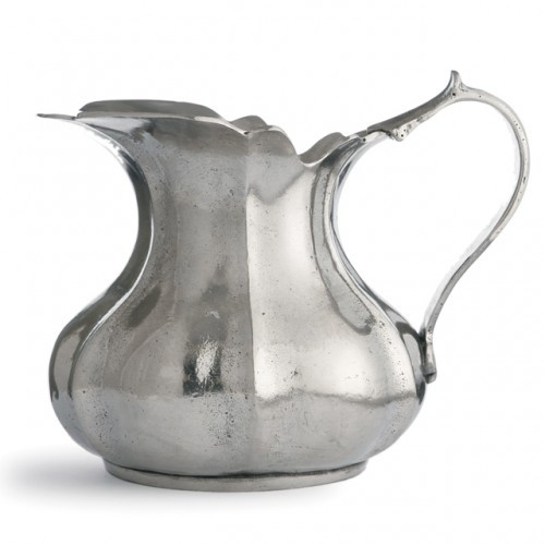 Each one-of-a-kind pitcher is a marriage of the highest quality pewter combined with the talents of Italian artisans, using techniques passed down through generations. Italian pewter, Hand made in Italy.

Dishwasher safe on the low-heat/air-dry setting, non-abrasive detergent recommended.

Dimensions: 5.5" H X 7" D, 28 OZ
SKU: VIN0390