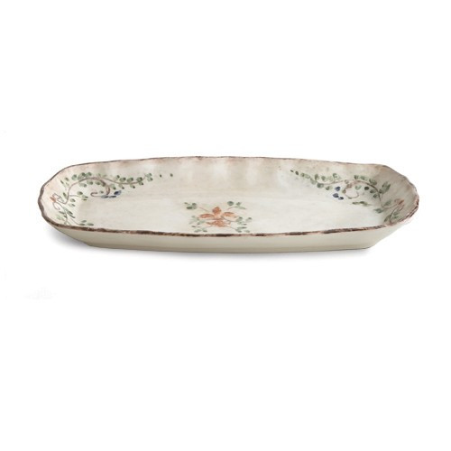 The gentle cream color of this platter is accented with a beautiful, hand-painted giglio (fleur-de-lis) and vine motif in rich hues of green, blue and orange. The uneven edges and subtle colors add to the old world look. Italian ceramic, Hand made in Italy.

Microwaveable (may get hot) and dishwasher safe on the low heat, air-dry setting.

Dimensions: 13.5" L X 7" W
SKU: MED233