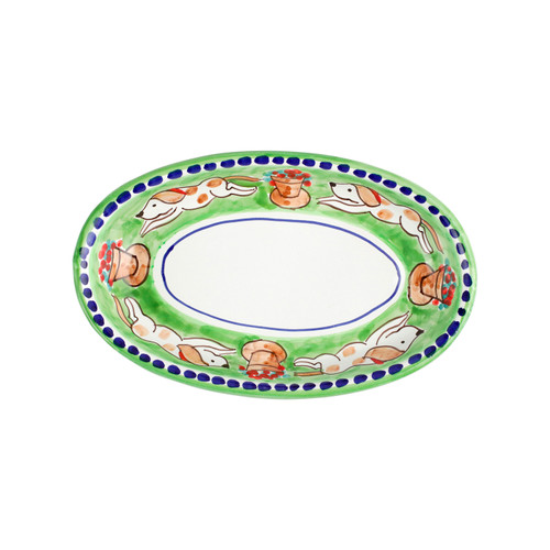 Vietri Cane Small Oval Tray
CNE-1040
10"L, 6.5"W

Part of Vietri's  premiere dinnerware line from the famed Amalfi Coast, Campagna from plumpuddingkitchen.com offers endless possibilities for artistic entertaining when mixed with solids or the other colorful patterns that capture the vitality of the Italian countryside.  The newest design, Cane, features whimsical handpainted pups playfully running through a seaside garden in Positano.

Translation: dog
Handmade of terra cotta in Campania
Part of the Campagna Collection, VIETRI's very first dinnerware collection introduced in 1983!
Dishwasher safe