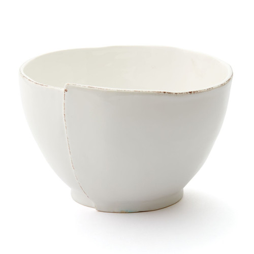 The simple sophistication of Lastra endures in useful new shapes, perfect for entertaining or everyday dining. Handmade of Italian stoneware in Tuscany, the Lastra White Deep Serving Bowl is just the right size for enjoying a bowl of freshly popped popcorn or finishing off the batter from a homemade batch of brownies.
8.75"D, 5.75"H
LAS-2633W