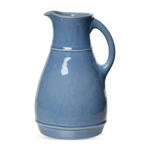 Juliska Puro Chambray Pitcher/Vase

KS22/47
6.5"L, 6"W, 10.25"H. 2.28Qt

From fresh juices to a bundle of blooms, Juliska's Chambray blue ceramic pitcher from plumpuddingkitchen.com offers an organic texture that blends everyday elegance with practicality to suit every décor aesthetic with ease.