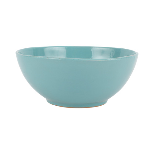 Vietri Cucina Fresca Turquoise Small Serving Bowl

CUF-2630TQ
9"D, 3.5"H

Cucina Fresca from plumpuddingkitchen.com was inspired by the Tuscan landscape. Paprika captures Italy's rich clay earth with a warm finish and deckled terra cotta edges reminiscent of peasant pottery.

Saffron, warm and inviting, embodies the softness of Tuscany's swaying fields of wheat and pays tribute to the original Cucina Fresca collection.

Tuscany's vibrant green grass is reimagined in Pistachio.

Handmade of terra cotta in Tuscany
In the 1300's, peasants used rustic glazes on their hand-thrown pottery that separated during firing, exposing the terra cotta on the edges of the pieces. VIETRI reproduces these edges on Cucina Fresca using clear glazes.
Part of the Cucina Fresca Family of Dinnerware
Dishwasher and microwave safe.