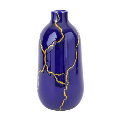 Vietri Storia Medium Vase

SRA-9782
6.5"D, 13.5"H

Inspired by the poetic Japanese art of Kintsugi and brought to life by maestro Italian artisans, each Storia piece celebrates the beauty found in imperfection. The Storia Large Vase features handpainted blue and white designs with gilded seams, and it exudes both old-world charm and modern high design. Each piece demonstrates the strength and elegance in resilience and makes a striking statement piece in your home.