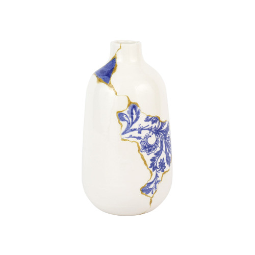 Vietri Storia Small Vase

SRA-9781
6"D, 11"H

Inspired by the poetic Japanese art of Kintsugi and brought to life by maestro Italian artisans, each Storia piece celebrates the beauty found in imperfection. The Storia Large Vase features handpainted blue and white designs with gilded seams, and it exudes both old-world charm and modern high design. Each piece demonstrates the strength and elegance in resilience and makes a striking statement piece in your home.