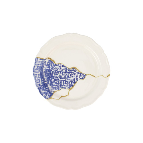 Vietri Storia Baroque Salad Plate

SRA-9701
8.5"D

Inspired by the poetic Japanese art of Kintsugi and brought to life by maestro Italian artisans, each Storia piece celebrates the beauty found in imperfection. The Storia Blue and Gold Round Platter features handpainted designs with gilded seams, and it exudes both old-world charm and modern high design. Each piece demonstrates the strength and elegance in resilience and makes a striking statement piece on your table.