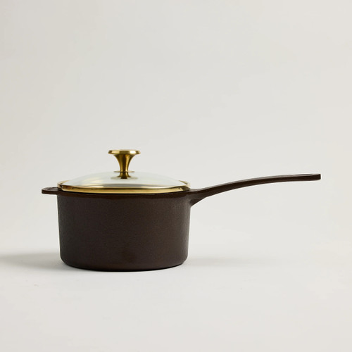 Smithey 1Qt Saucepan

Smith-CI-Sauce1
Diameter (top): 6.375”
Depth: 4.125”
Cook Surface: 5”
Length (with handle): 13.375”
Volume: 1.5 Qt


Smithey created this 1-quart cast iron saucepan with a custom glass lid to round out your collection and serve as the perfect sidekick for meals that call for sauces, roux, gravies, and more. Its depth makes it ideal for indulgent side dishes like butter-poached potatoes and fried green beans. The lid locks in warmth, allowing you to move seamlessly from stovetop to tableside to serve decadent confits, spicy chili crisps, or savory sauces to your guests. It’s a perfect addition to your Smithey kitchen and an essential companion when cooking.  This saucepan comes pre-seasoned, meaning it’s ready to use right out of the box. To break it in, start with side dishes and rich sauces that incorporate butter or other fats. While it may seem like an ideal rice pot, we do not recommend using this saucepan for boiling water