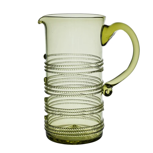 Juliska Ella Pitcher - Green

B816/29
7"L, 5.25"W, 9"H, 1.9 Qt

Ella's jewelry-like spiraling thread catches the light with its uplifting swirl and brings sparkle to every sip. Mouth-blown by Juliska's master artisans in exquisite detail, these functional works of art elevate your everyday.

Made in Czech Republic

Dishwasher safe, warm gentle cycle. Hand washing is recommended for large or highly decorated pieces. Not suitable for hot contents, freezer or microwave use.