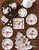 Juliska Country Estate Winter Frolic "The Claus' Christmas Day" Ruby Dessert/Salad Plate
CE02X/73
9"D

Juliska's charming English Country Estate is snow covered for the holidays! In this latest chapter of the estate at Christmastime, Santa & Merry celebrate with all the North Pole inhabitants. This subtly scalloped dessert/salad plate from plumpuddingkitchen.com features ‘The Claus’ Christmas Day” including Santa & Merry ice skating on the pond outside the Boathouse.