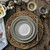 Juliska Le Panier Grey Mist Dessert/Salad Plate

KH02/93

Hand painted in a gentle grey wash, Juliska's texturally woven Le Panier Grey Mist Dessert/Salad plate from plumpuddingkitchen.com is a gorgeous neutral color that offers an alternative to everyday white, and layers just as effortlessly with many different patterns, such as Forest Walk, Country Estate, Berry & Thread, Pewter Stoneware and more. 

Made in Portugal. Dishwasher, freezer, microwave and oven safe.

9"D