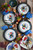 Vietri Gallo Round Platter with Italian Rooster colorful design from plumpuddingkitchen.com.