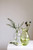 Vietri Hibiscus Glass Green Vertical Fluted Small Vase

HBS-8578G-GB
4.25"D, 7.5"H, 26oz

The ultimate in easygoing elegance, the Hibiscus Glass Vertical Fluted Small Vase is inspired by the soft and delicate elements of its namesake flower. Italian artisans mouthblow each petal-inspired curve and curl, and the result is beautiful, understated, and versatile. The vases are gorgeous with any style of bouquet, or they make a statement on display on their own.