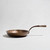 Smithey Carbon Steel Fish Skillet

SMI-FishCC
Length (top): ~13.8”, Width (top): ~9.7", Total Length: ~21",
Depth: ~1.8”, Cook Surface: ~11x7", Weight: +/- 6 lbs

One of life’s truly memorable cooking experiences is a whole roasted fish. Fresh trout, snapper, walleye, salmon fillets and so many more are not only delicious, but the centerpiece of an inspired and healthy meal. Our new Carbon Steel Fish Skillet has been crafted in a distinctive oval shape that is perfect for cooking fish over the flame or in the oven. The skillet is also ideal for long vegetables such as carrots, beans and asparagus. This is cookware that’s PERFECTLY DONE.