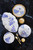 Vietri Storia Baroque Oval Platter

SRA-9724
21.75"L, 13.75"W

Inspired by the poetic Japanese art of Kintsugi and brought to life by maestro Italian artisans, each Storia piece celebrates the beauty found in imperfection. The Storia Blue and Gold Round Platter features handpainted designs with gilded seams, and it exudes both old-world charm and modern high design. Each piece demonstrates the strength and elegance in resilience and makes a striking statement piece on your table.
