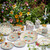 Juliska Sofia 16pc Place Setting - Multi

SOF200SET/88

Inspired by wildflowers and watercolors, this fantasy floral motif is bursting with life in vibrant hues to enliven your table. An artful balance of lavish and whimsical—intricate curling vines, tiny blossoms and unfurling blooms are captured in a painterly palette of petal pinks, garden greens, iris blues, and daffodil yellows—and rimmed in a romantic, ruffled silhouette. This 16-piece set provides service for four people and includes four of each: dinner plates, dessert/salad plates, cereal/ice cream bowls and mugs.