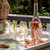 Juliska Provence Glass Provence Stemless Wine Glass 

PVG118/C

Inspired by the traditional bubbly glassware from Provence while making use of sturdy construction to make everyday drinking effervescent. For wine, water or a seasonal spritz (with or sans alcohol) this mouth-blown, stemless wine glass brings a charming spirit of joie de vivre to every sip. Offered in four chic and versatile hues: Basil, Chambray, Blush, and Clear (we always love to add a pop of color to the table with colorful glass)!


Measurements: 3.4" x 3.4" x 4.4"

14 oz
Made in: Thailand
Made of: Glass
Dishwasher safe, warm gentle cycle. Not suitable for hot contents, freezer or microwave use.
