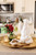 Vietri Pietra Natale Figural Chef Santa

PNA-2695
7"L, 5"W, 11"H

A festive friend to the Pietra Serena collection, Pietra Natale shares Pietra Serena’s handpressed edges, and it adds its own spirit with joyful depictions of Babbo Natale, Italy’s Santa Claus. Brimming with charming details like Babbo Natale’s handpressed beard, mittens, and coat pocket for treasures, Pietra Natale is sure to bring delight to your holiday table for years to come.