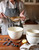 Vietri Italian Kitchen White Small Mixing Bowl

ITK-2930W
7"D, 4"H

A marriage of form and function, the Italian Kitchen Collection from plumpuddingkitchen.com features handcrafted pieces that bring simple elegance to your kitchen space. 

Designed for both beauty and function, these Italian pieces bring Italy home.

Handcrafted of Italian stoneware in Umbria.

Dishwasher, microwave, freezer and oven safe.