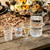 Juliska Ella Small Tumbler 

B819/C
3.75"W, 4"H, 12oz

Ella's jewelry-like spiraling thread catches the light with its uplifting swirl and brings sparkle to every sip.

Mouth-blown by Juliska's master artisans in exquisite detail, these functional works of art elevate your everyday.

Made in Czech Republic