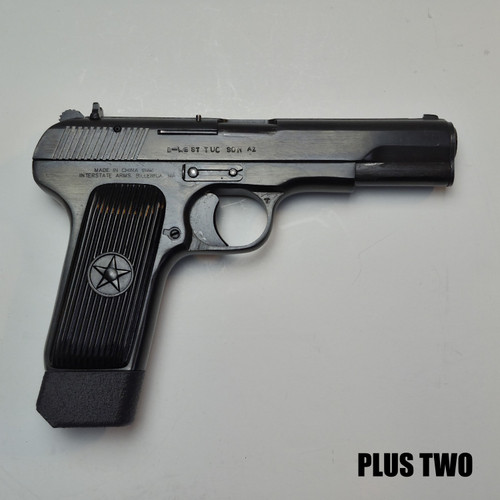 Tokarev 9mm pistol with Total Innovative magazine extension pinky rest attached, side profile.