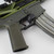 AR-15 Trigger Guard with Finger Rest attached to lower displayed, made by Total Innovative Tactical Solutions.