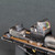 Charge handle does not obscure shroud-mounted optic.