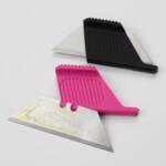 Ergonomic Utility Blade Tool, made by Total Innovative Tactical Solutions, lets you slot in safety razor into ergonomic handheld design. Comes in black or hi-viz pink.